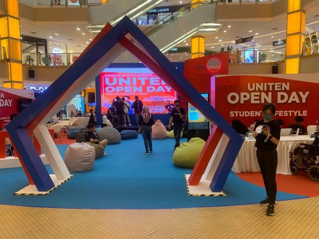 Uniten Open Day activation with branded arch structure in a shopping mall